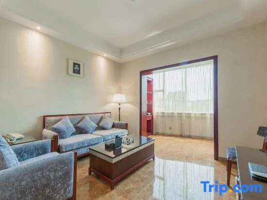 Yi Long Hotel - Chambres