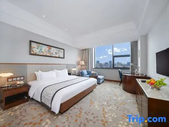 Gloria Plaza Hotel Qingdao - Chambres