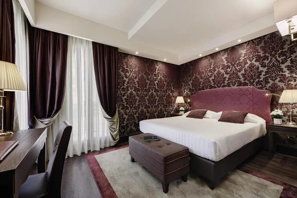 Hotel American Dinesen - Chambres
