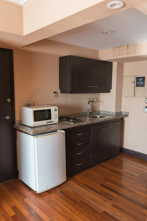 Premium Tower Suites San Luis - Chambres
