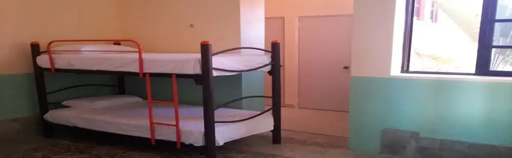 Bed in Dorm (female dorm) with pool view