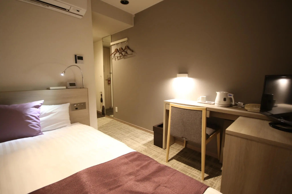 Kita Hotel - Chambres
