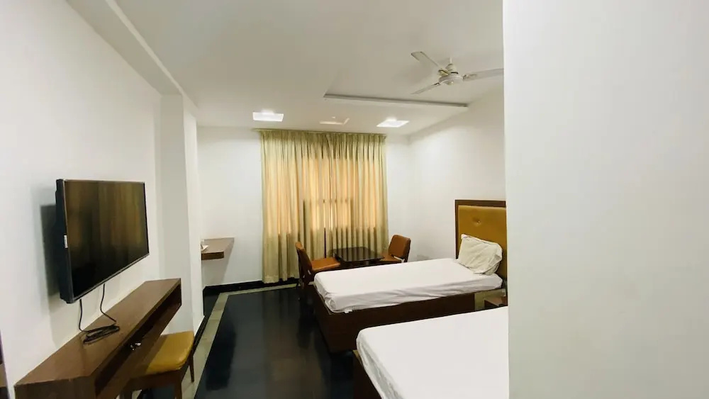 Amaravathi Hotel - Chambres