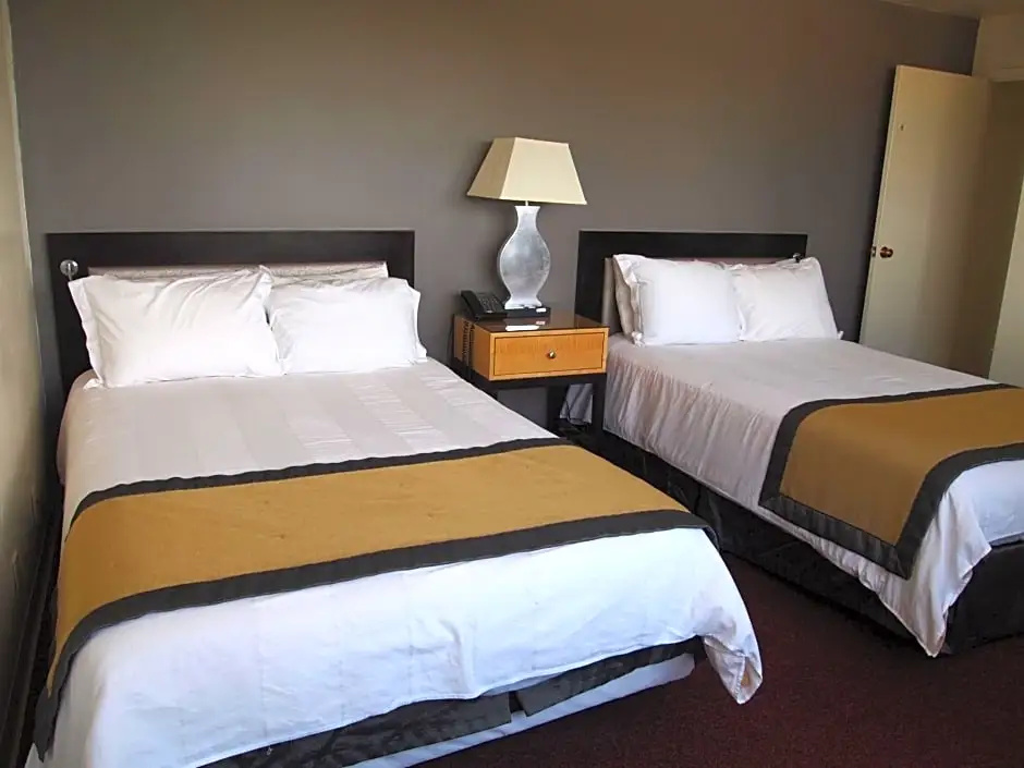 Stamford Suites - Chambres