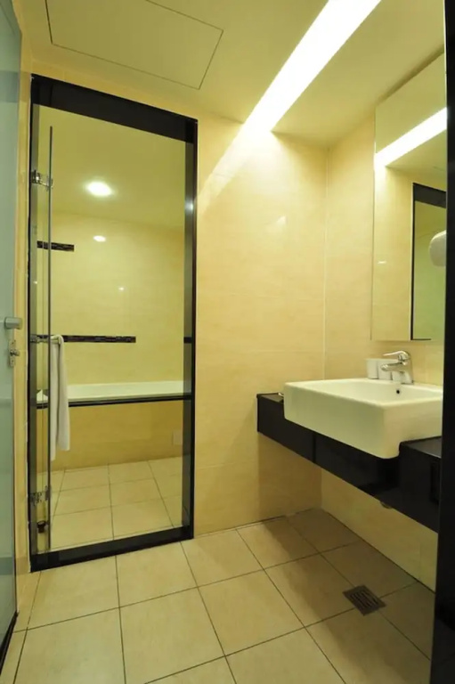 Goodness Plaza Hotel - Chambres