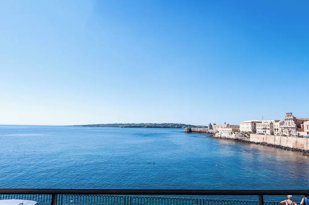Una Finestra Su Cala Rossa by Wonderful Italy