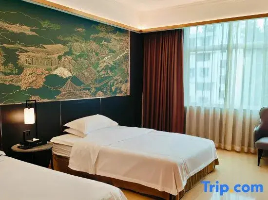 Kaiyue Hotel - Chambres