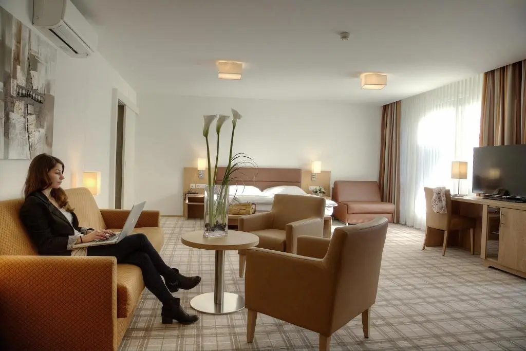 Central City Hotel Rochat - Chambres