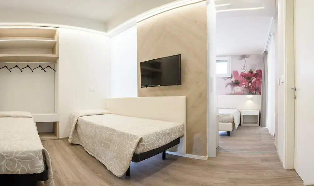 Prestige Quadruple Suite with balcony and with partial sea view
