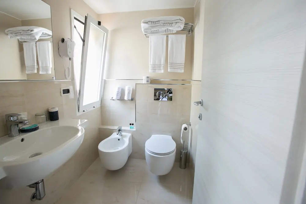 Arc en Ciel Hotel - Chambres