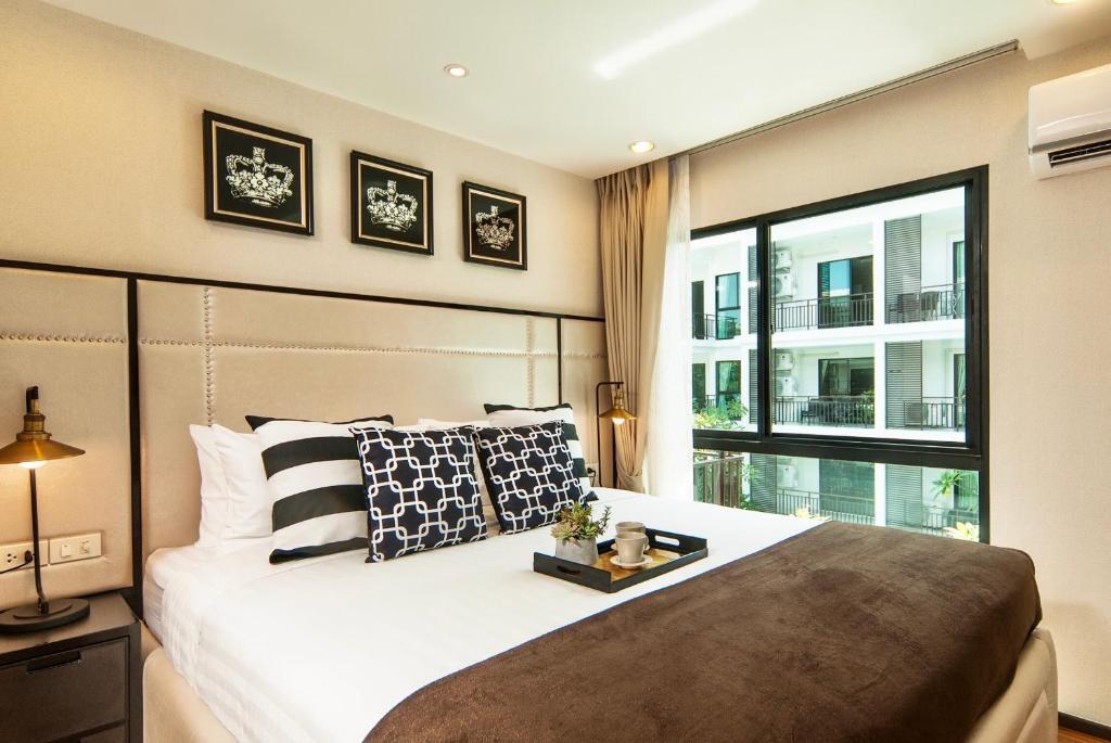 Люкс c 1 комнатой с видом на бассейн в The Title KR Beach Condotel Rawai Phuket