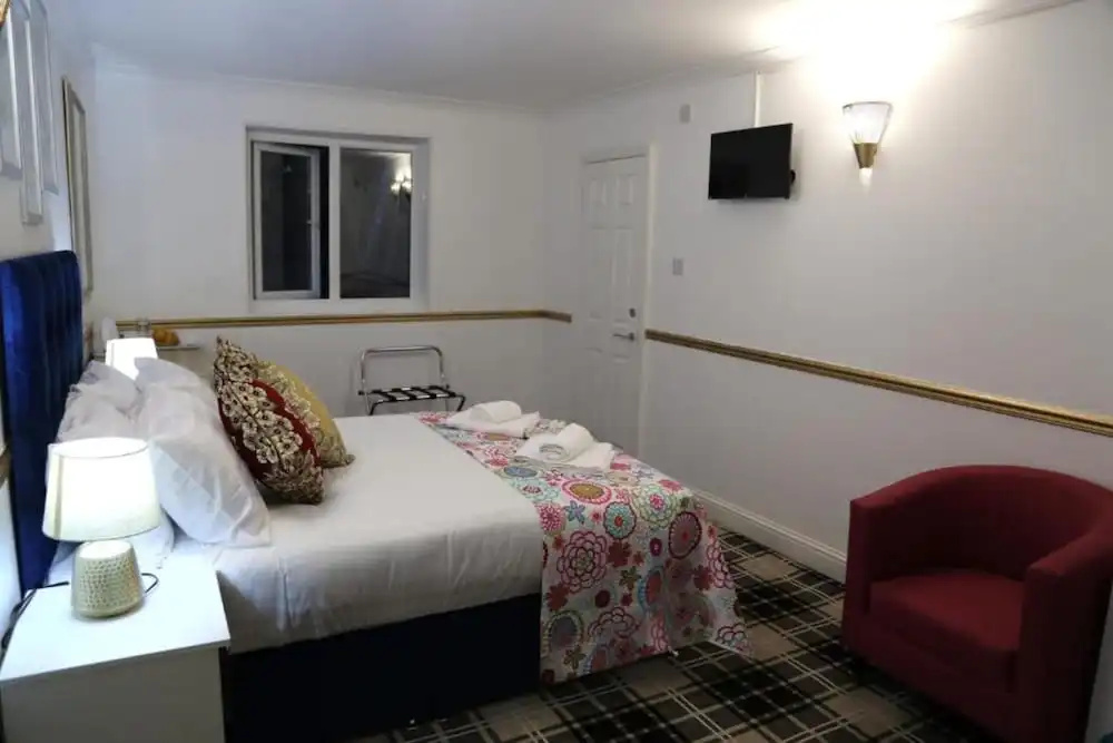 OYO 4 Sisters Inn - Chambres