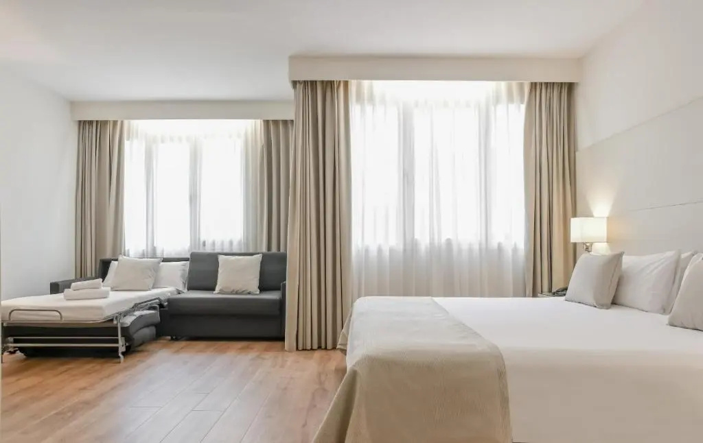 Aparthotel Mariano Cubi - Chambres