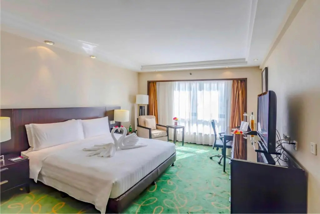 Guo Ji Yi Yuan Hotel - Chambres