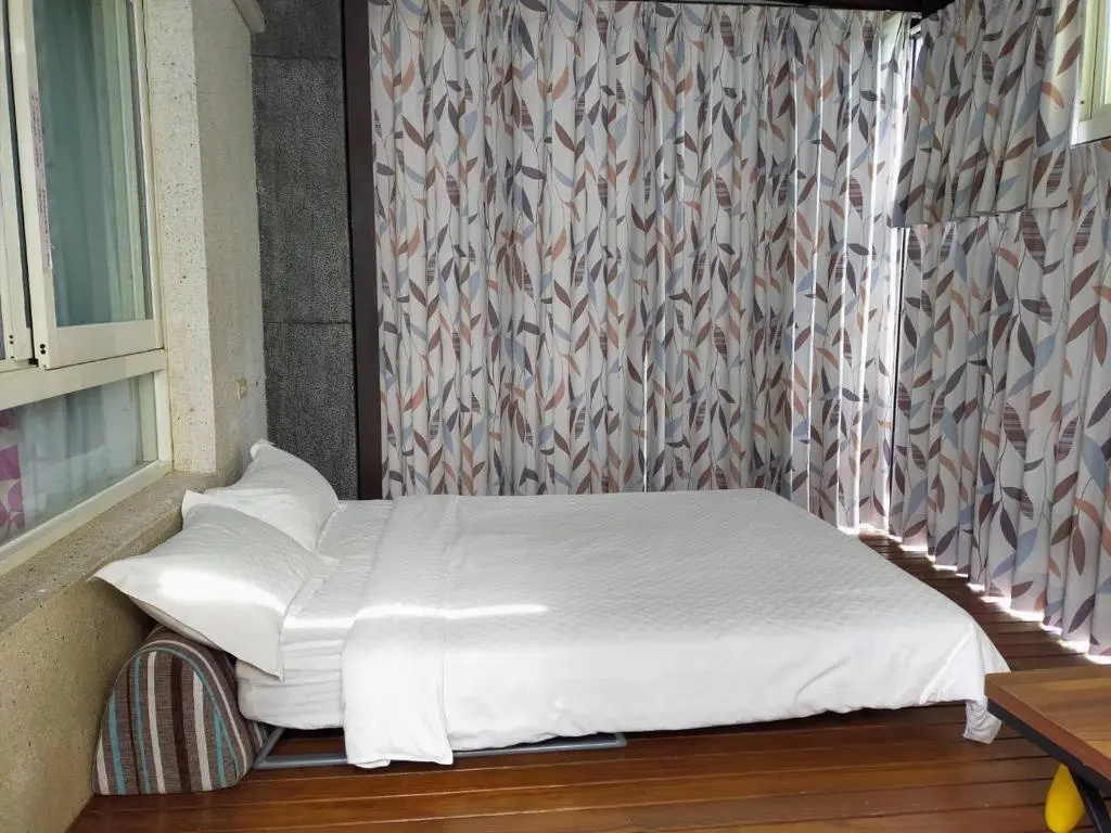 Standard Quadruple room with garden view