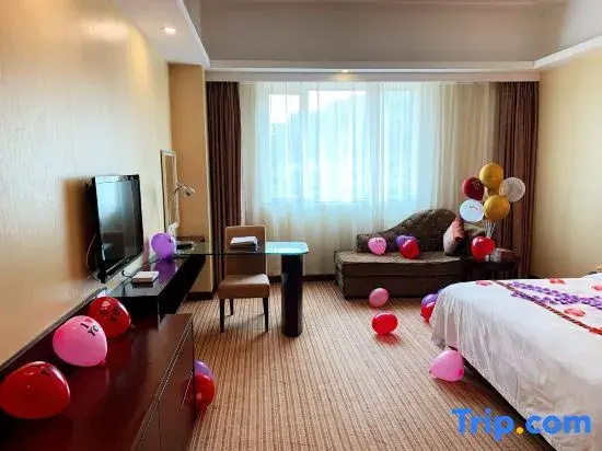 Longzhu Hotel - Chambres