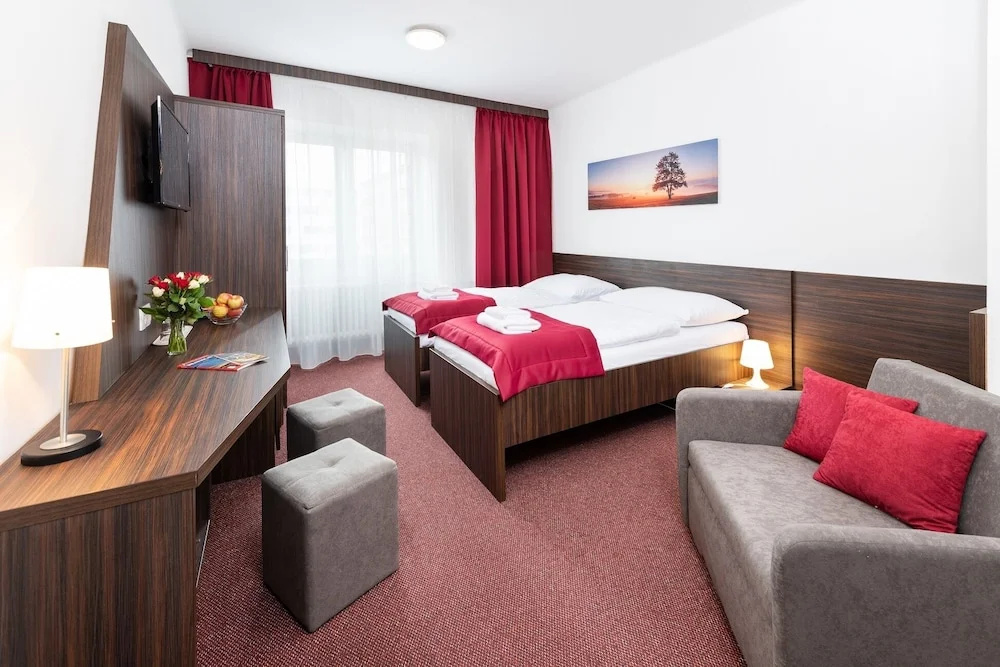Hotel Plus - Chambres