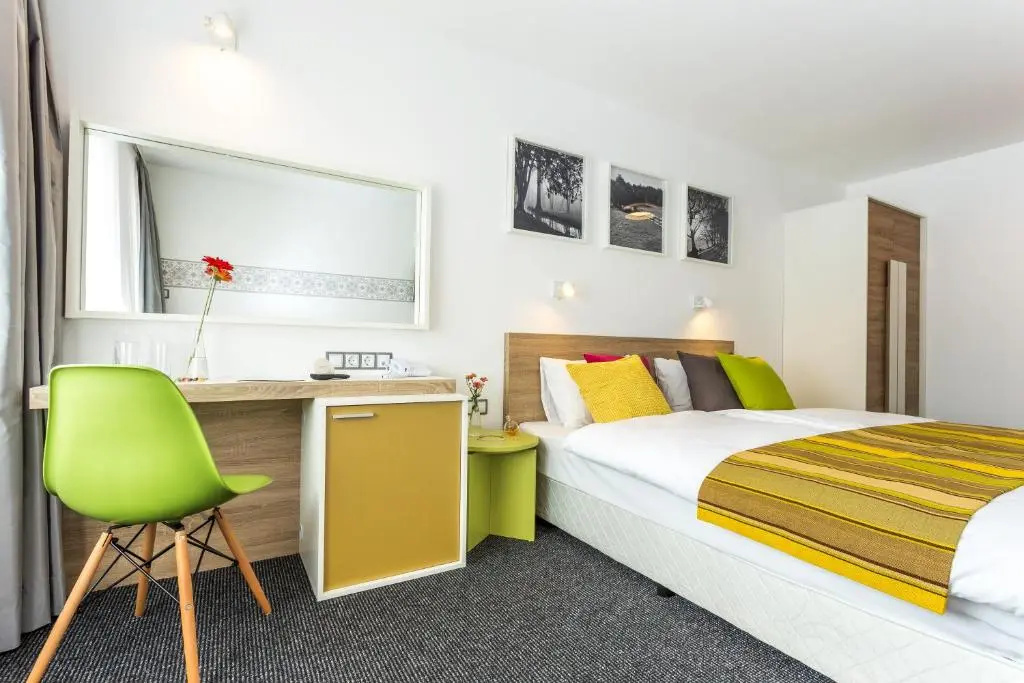 Hotel Compliment - Chambres