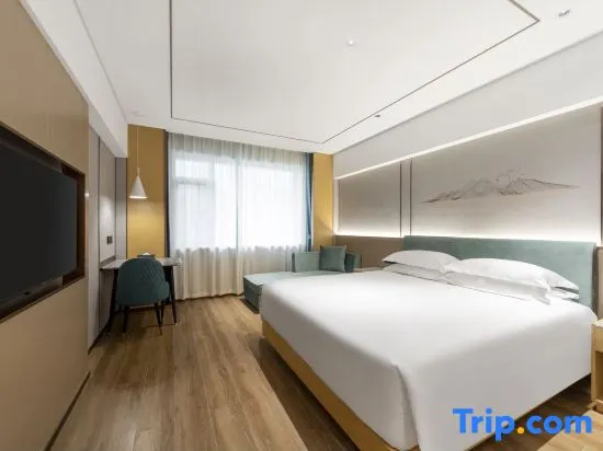 Xinyue Hotel - Chambres