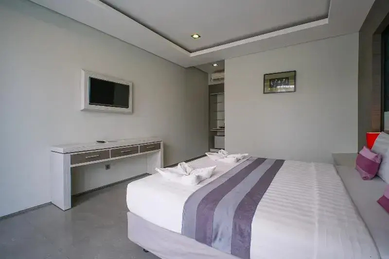 Kamini Legian Hotel - Chambres