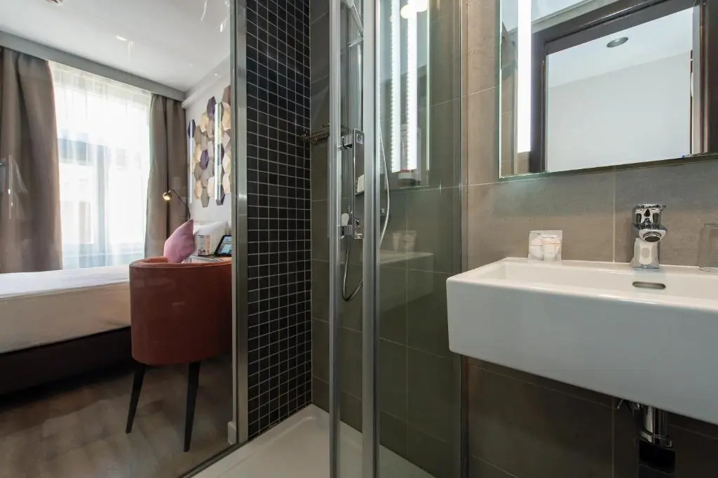 Three Corners Hotel Art - Chambres