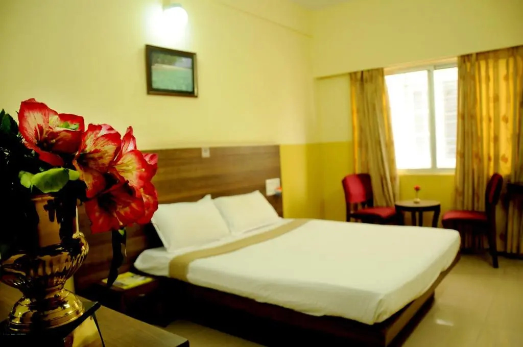Suvarna Residency - Chambres