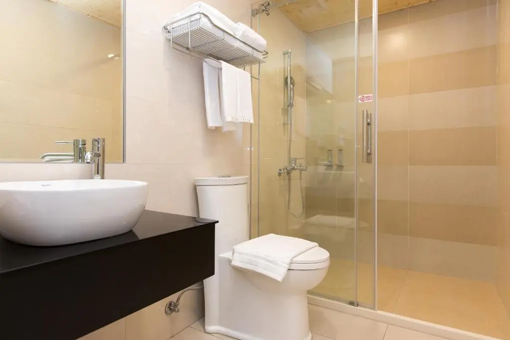 Standard Triple room with garden view