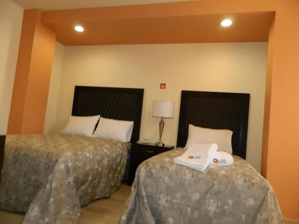 Hotel Plaza Bernal - Chambres