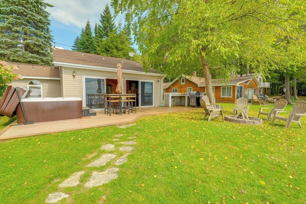 Kalkaska Retreat: Private Hot Tub, Dock, Fireplace