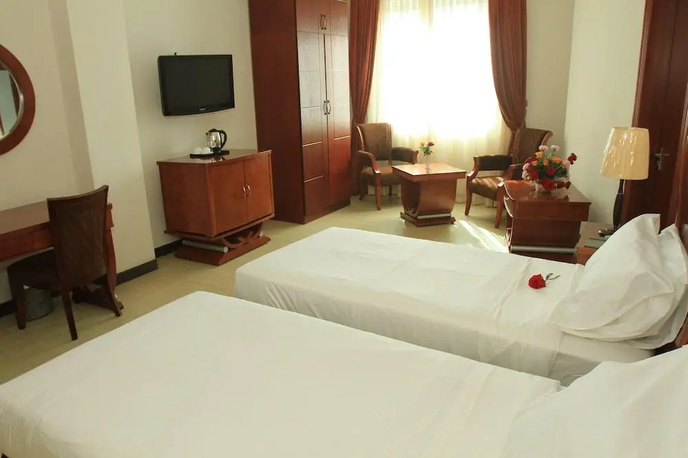 Aphrodite International Hotel - Chambres