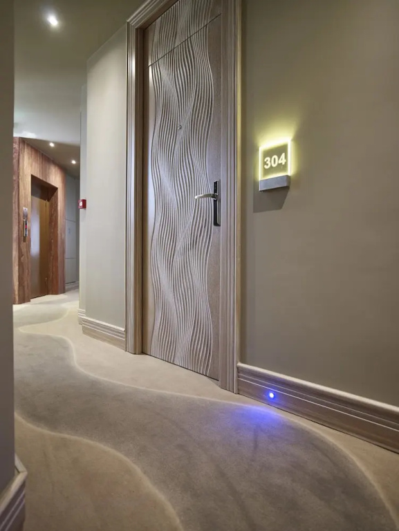 Kyma Suites Beach Hotel - Chambres