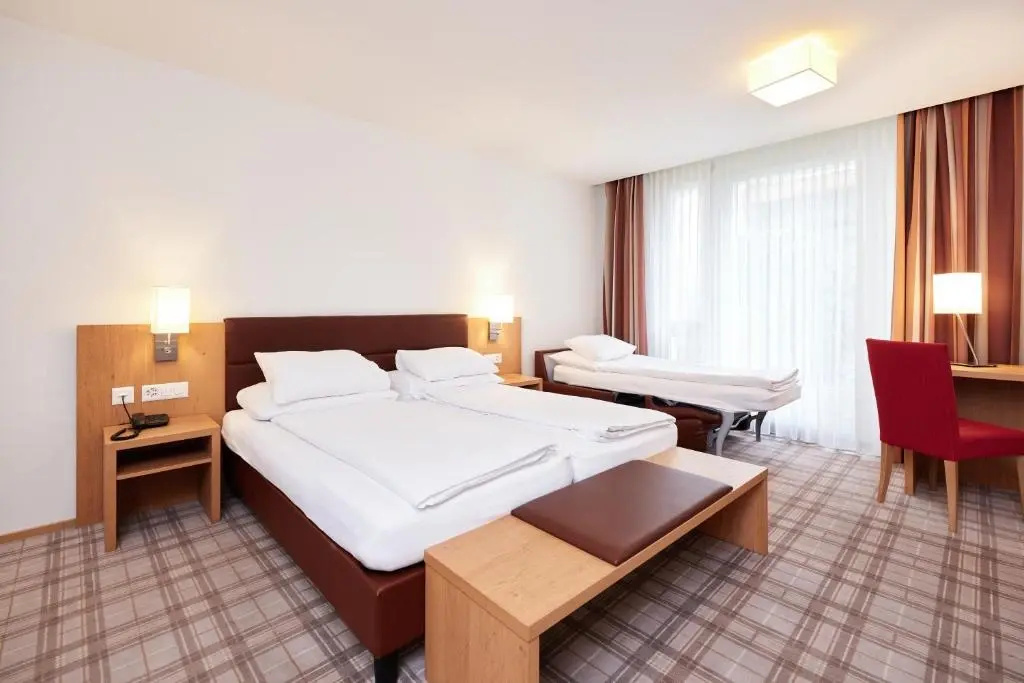 Central City Hotel Rochat - Chambres