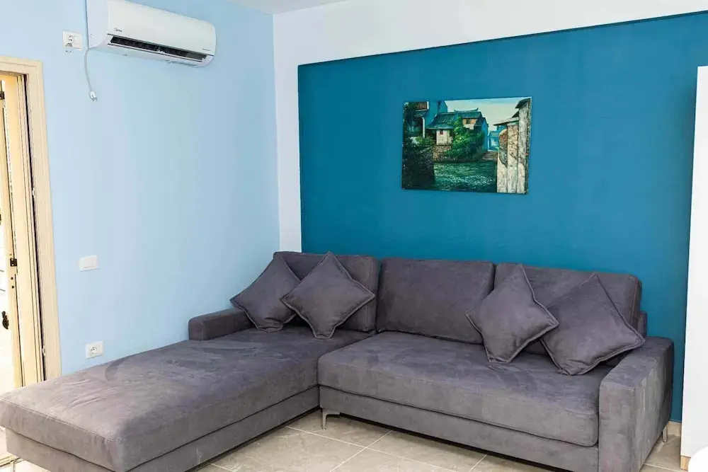 Apartment with balcony and with garden view