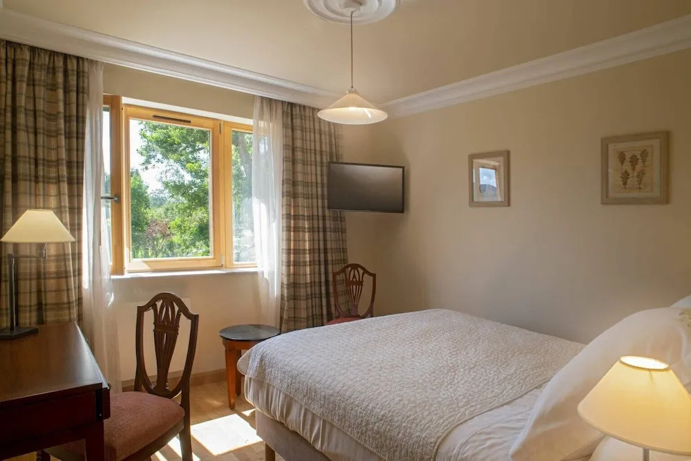 Le Manoir au Lac - Chambres