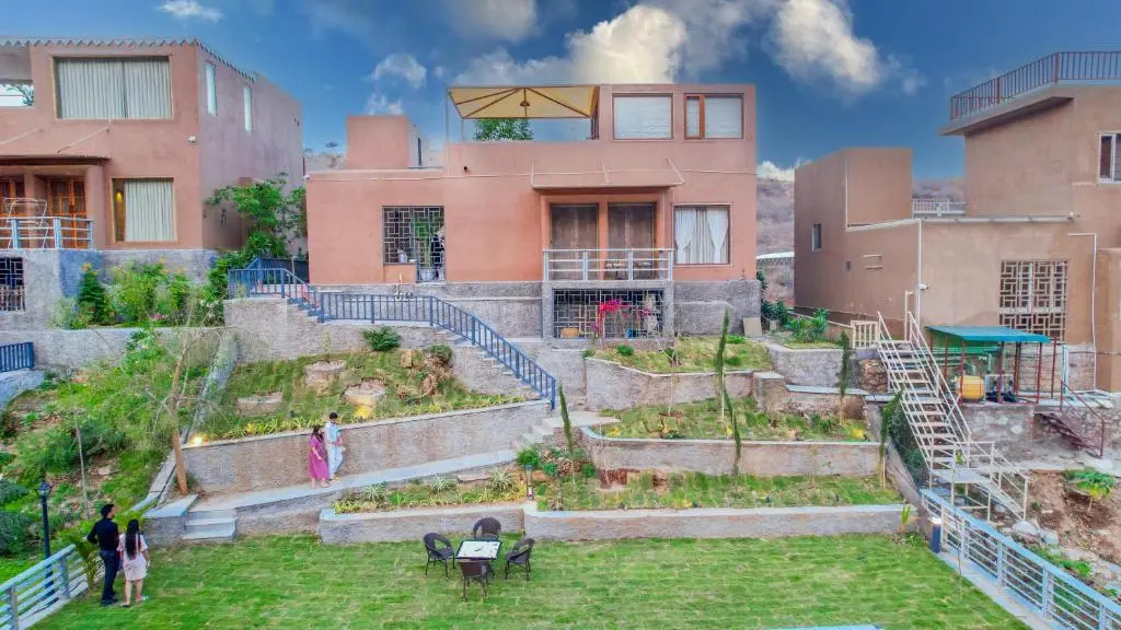 SaffronStays Moringa WishingTree - 3-BR villa near Nathdwara with pool, lawn and hillside views