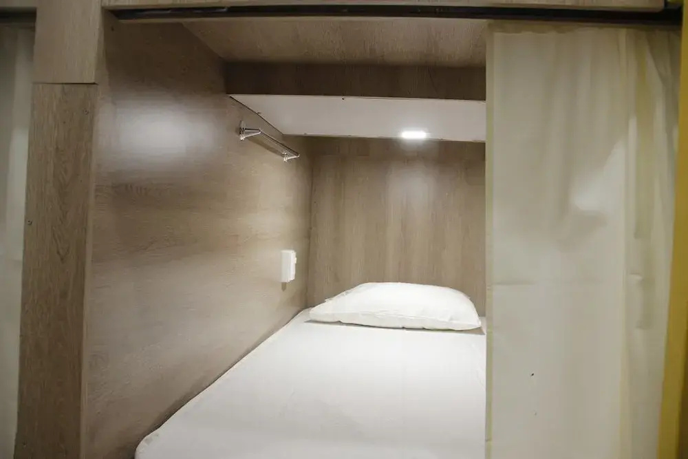 Bed in Dorm (female dorm) with balcony