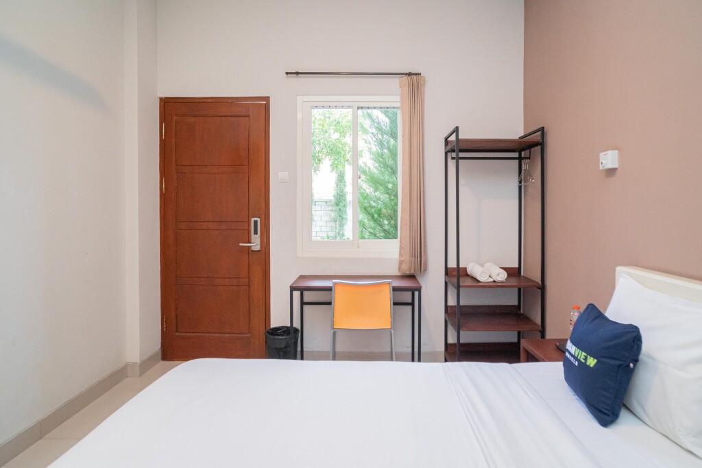Номер Superior в Urbanview Hotel Bubusini Batu by RedDoorz