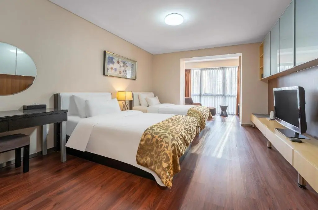 Qingdao Housing International Hotel - Chambres