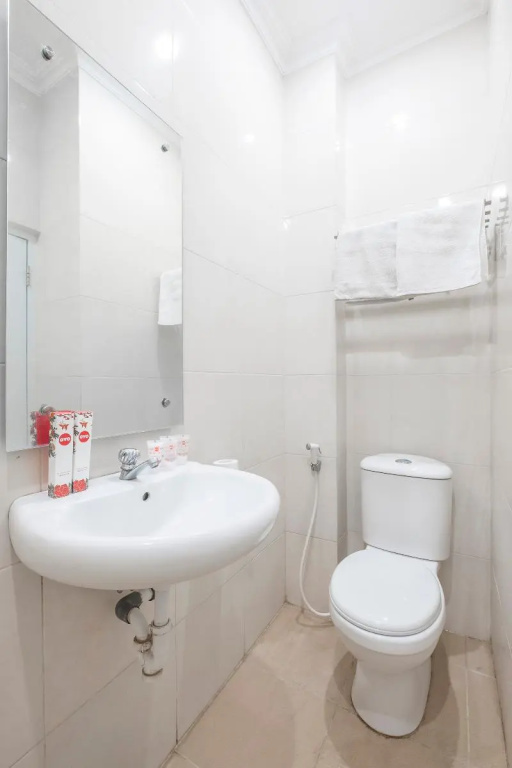 RedDoorz Plus @ Grand Pacifik Hotel Makassar - Chambres