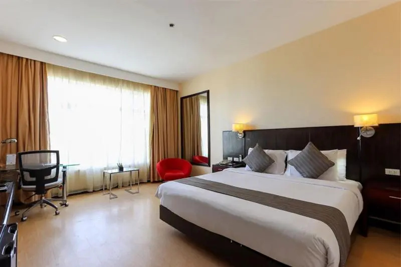 Paseo Premiere Hotel - Chambres