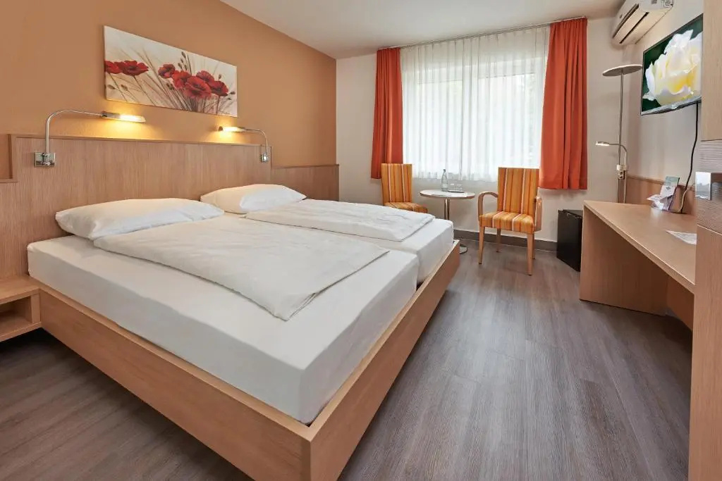 Hotel Touristik - Chambres