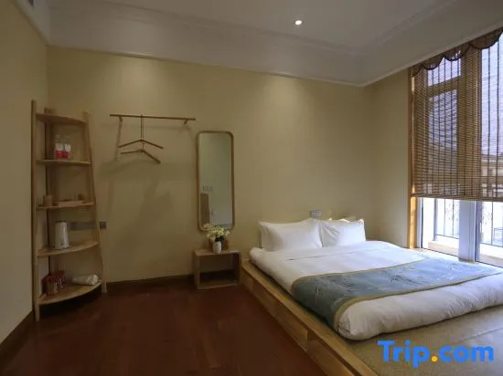 Gloria Plaza Hotel Qingdao - Chambres