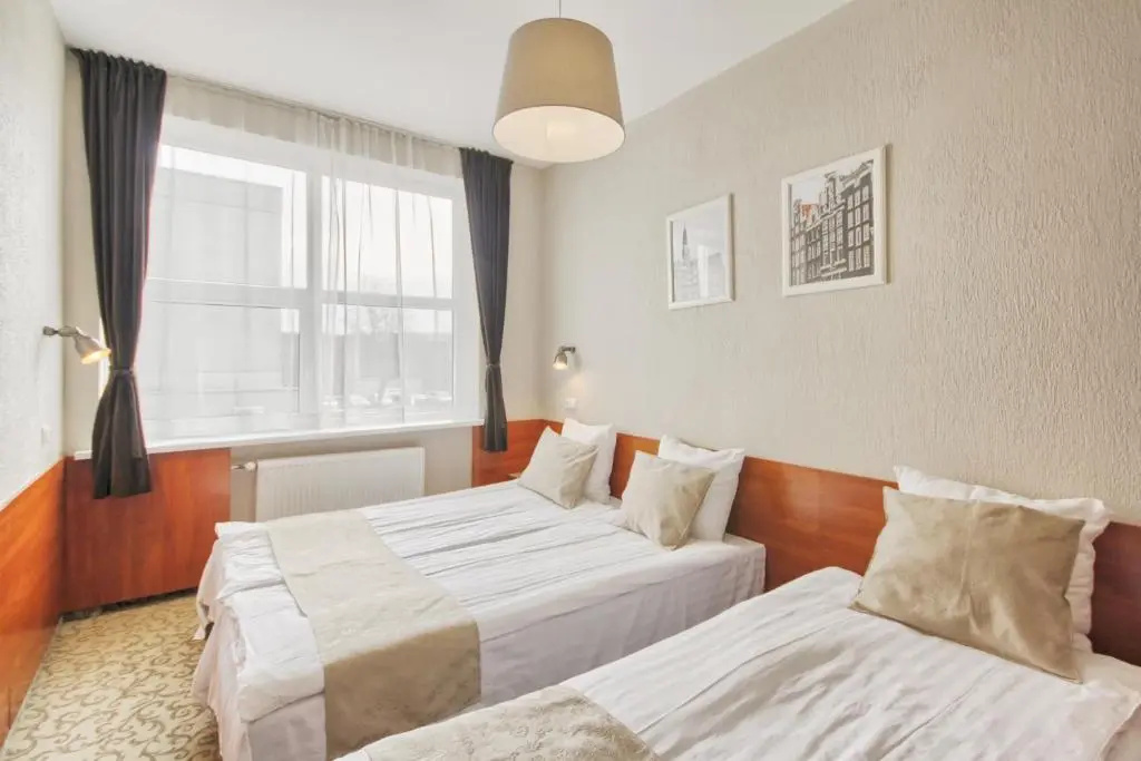 Inza Hotel - Chambres