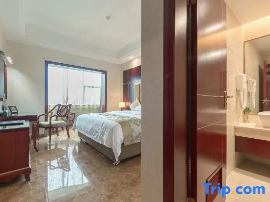 Yi Long Hotel - Chambres