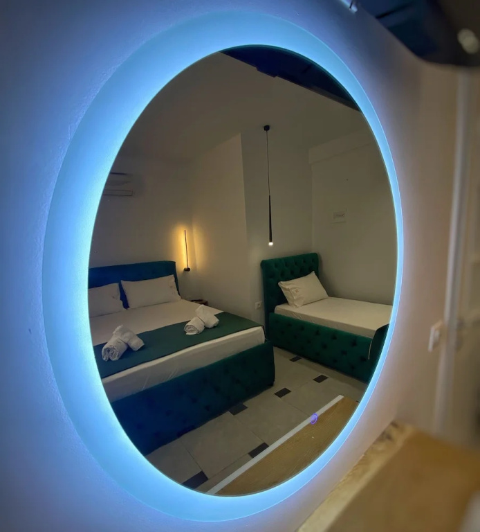 Standard Triple room with garden view
