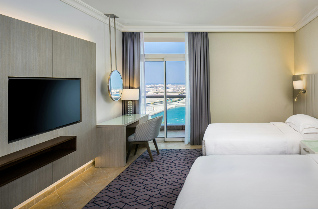 Отель Beach Rotana Hotel - All Suites в Абу-Даби