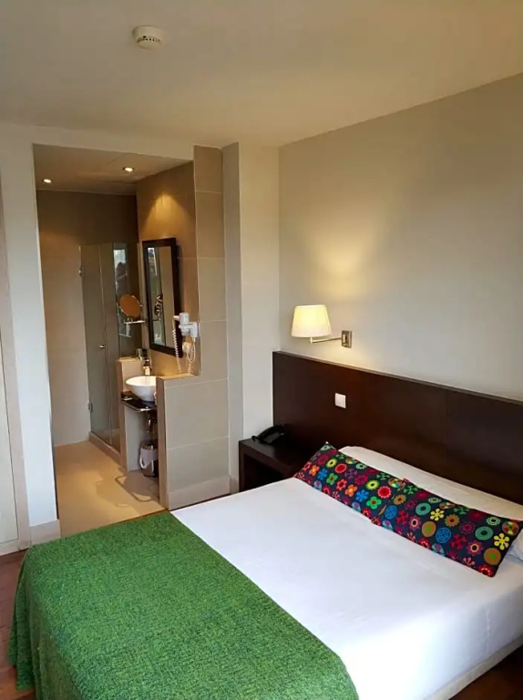 Hotel Puerta Del Arco - Chambres