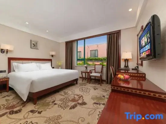 Dong Cheng Hotel - Chambres