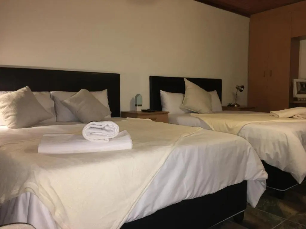 Cura Lodge - Chambres