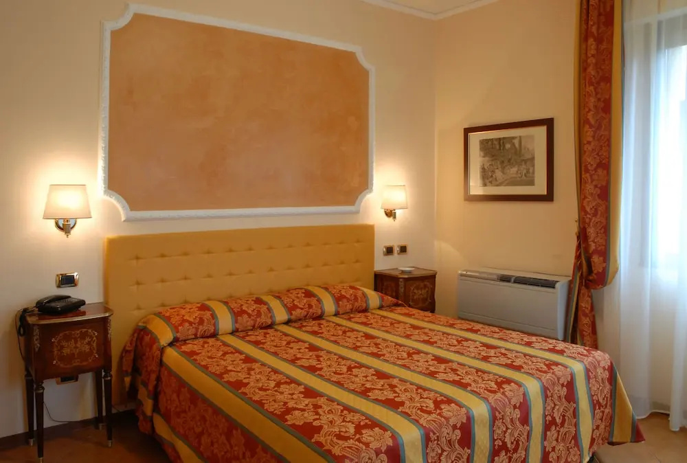 Hotel Mondial - Chambres
